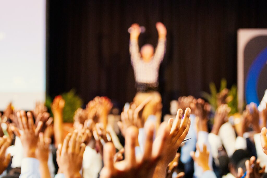 group raising hands